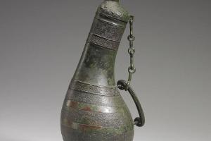 战国   西元前5-前3世纪 绹纹鸟首瓠形壶