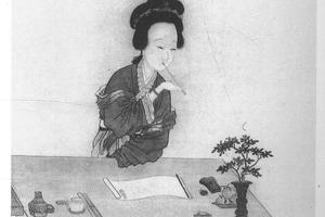 吮笔敲诗图