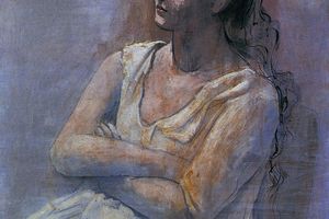 Femme assise dans un fauteuil1
