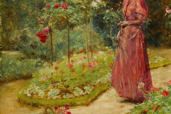 在花园里修剪玫瑰的女人(Woman Cutting Roses in a Garden)