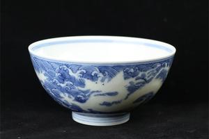快雪时晴青花海水雕刻龙纹杯