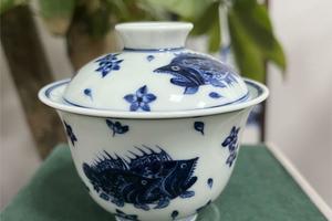 青花青仿明桃花桂鱼两才盖碗