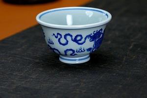 仿清双狮嬉球压手杯